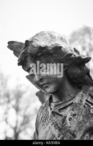 RAHWAY, NEW JERSEY - April 28, 2017: Details of an angel statue atop a grave at Rahway Cemetery Stock Photo