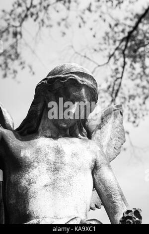 RAHWAY, NEW JERSEY - April 28, 2017: Details of an angel statue atop a grave at Rahway Cemetery Stock Photo