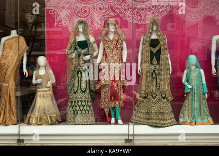 HYDERABAD,INDIA-25th SEPTEMBER,2017.I Mannequins draped in traditional ethnic indian wear on display behind a glass window to attract customers in Hyd Stock Photo