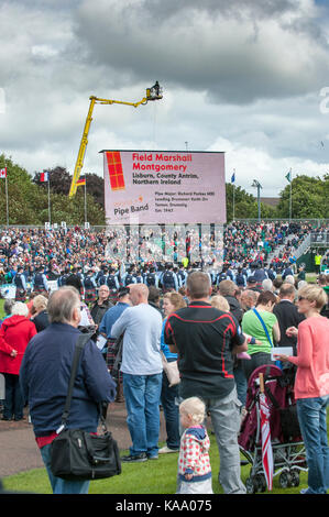 Crowds of spectators watching Field Marshal Montgomery Pipe Band at the World Championships on Glasgow Green, lead by Pipe Major Richard Parkes, MBE Stock Photo