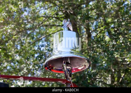 The shiny chrome bell of a 1925 American LaFrance fire engine on display at the 37th Annual Fire Apparatus Show and Muster in Millville, New Jersey. Stock Photo