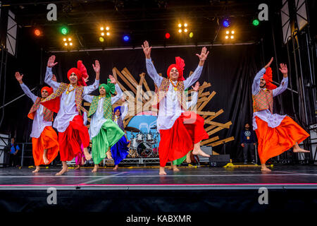 Royal Academy of Bhangra Dancers perform Punjabi Folk dance, Vancouver, British Columbia, Canada. Stock Photo
