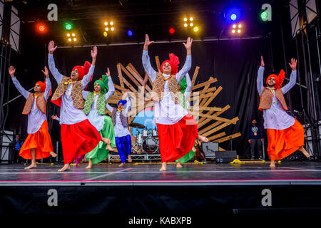 Royal Academy of Bhangra Dancers perform Punjabi Folk dance, Vancouver, British Columbia, Canada. Stock Photo
