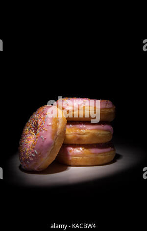 doughnuts on a black background Stock Photo