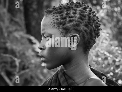 Bodi girl attending Kael tribe ceremony, Gurra, Hana Mursi, Omo Valley, Ethiopia Stock Photo