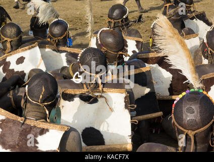 Bodi tribe men celebrating Kael ceremony, Gurra, Hana Mursi, Omo Valley, Ethiopia Stock Photo