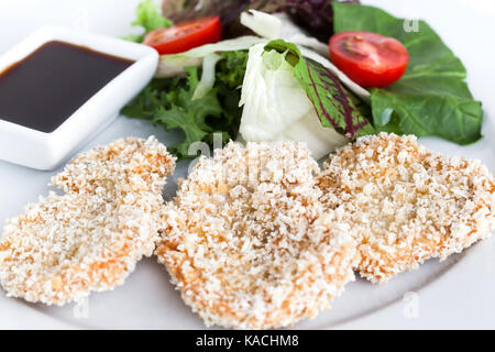 Breading pork with fresh vegetables Stock Photo