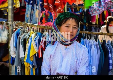 Ha Giang, Viet Nam - November 08, 2015:Unidentified traditionally dressed girls of Hmong ethnic minority tribe in Vietnam. Hmong people are known for  Stock Photo