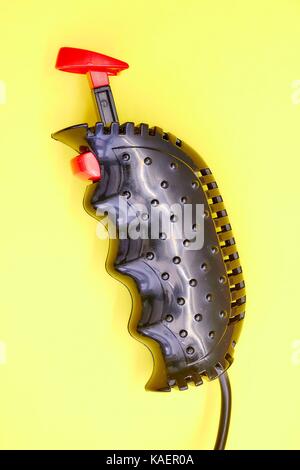 A studio photo of a game controller Stock Photo