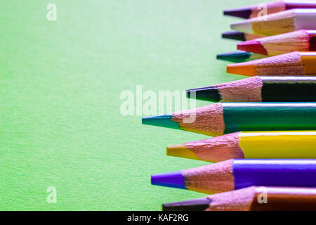 Pointed Pencil Isolated on Green Background Stock Photo