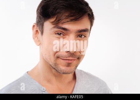 Handsome bristled man posing on white background Stock Photo