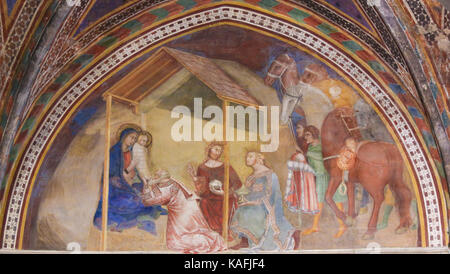 Renaissance Fresco depicting an Epiphany Scene, the Visit of the Three Kings, in the Collegiata of San Gimignano, Italy. Stock Photo