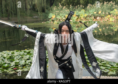 Chinese girl dresses as character from JX3 kingsoft games for cosplay photography in Beijing, China. Stock Photo