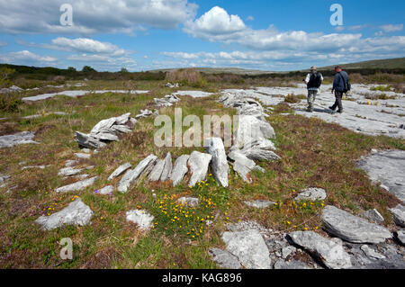 Hiking in the Burren National Park, County Clare, Ireland Stock Photo