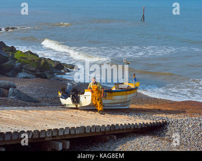 Crab fishermen landing boat at Sheringham  Norfolk Stock Photo