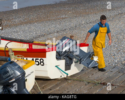 Crab fishermen landing boat at Sheringham  Norfolk Stock Photo