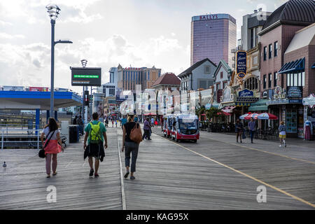 Unidentified people on boardwalk in Atlantic City, USA. Stock Photo