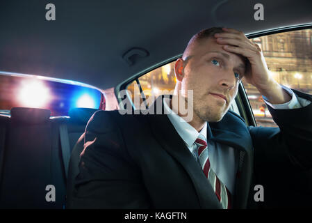 Stressed Young Driver Has Problems With Police Stock Photo