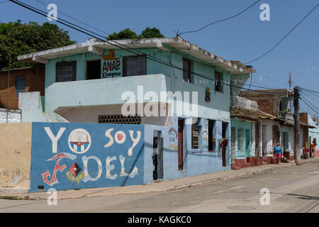 Street art in support of Fidel Castro painted on a street wall in Trinidad, Cuba. Stock Photo