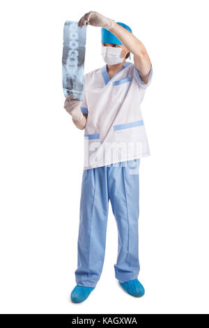 medical doctor looking at x-ray picture of spinal column  isolated on white background Stock Photo