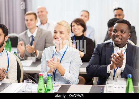 people applauding at business conference Stock Photo