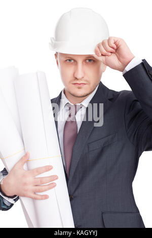 Engineer wearing white hardhat with blueprints isolated on white background Stock Photo