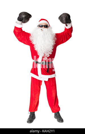 Santa Claus wearing sunglasses with boxing glove smoking a cigar isolated on white background Stock Photo