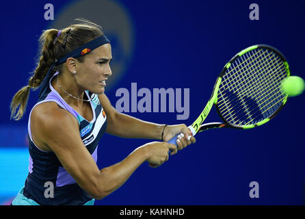 Wuhan, China. 26th Sep, 2017. Monica Puig of Puerto Rico returns the ball during the singles second round match against Peng Shuai of China at 2017 WTA Wuhan Open in Wuhan, capital of central China's Hubei Province, on Sept. 26, 2017. Monica Puig won 2-1. (Xinhua/Wang Peng)(wdz) Credit: Xinhua/Alamy Live News Stock Photo