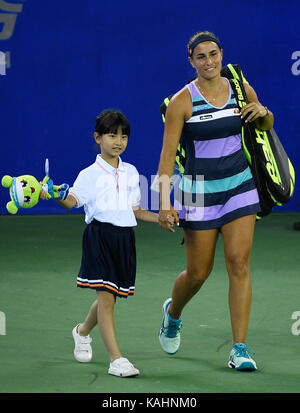 Wuhan, China. 26th Sep, 2017. Monica Puig of Puerto Rico walks into the court during the singles second round match against Peng Shuai of China at 2017 WTA Wuhan Open in Wuhan, capital of central China's Hubei Province, on Sept. 26, 2017. Monica Puig won 2-1. (Xinhua/Wang Peng)(wdz) Credit: Xinhua/Alamy Live News Stock Photo