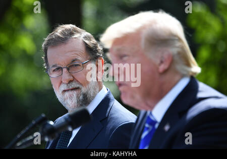 Washington, USA. 26th Sep, 2017. Visiting Spanish Prime Minister Mariano Rajoy (L) attends a joint press conference with U.S. President Donald Trump at the White House in Washington, DC, the United States, on Sept. 26, 2017. Credit: Yin Bogu/Xinhua/Alamy Live News Stock Photo