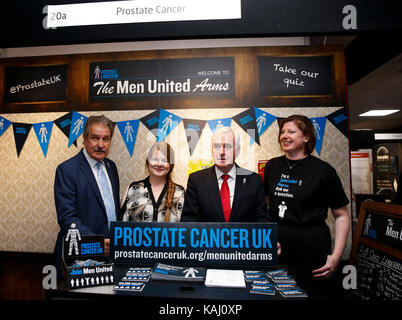 Brighton, Britain. 26th Sep, 2017. Labour Party's Shadow Chancellor John McDonnell (2nd R) poses with exhibitors of Prostate Cancer UK during his visit at Labour Party Annual Conference 2017 in Brighton, Britain, on Sept. 26, 2017. Credit: Han Yan/Xinhua/Alamy Live News Stock Photo