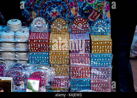 Beautifully decorated small boxes kept for sale in a shop. Stock Photo