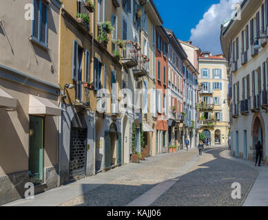 Small colourful street in the fashionable district of Brera in Milan, Lombardy, Italy Stock Photo