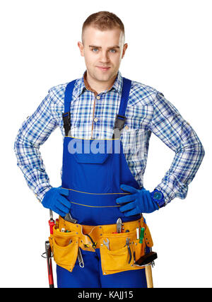 Portrait of young male construction worker with tool belt isolated on white background Stock Photo