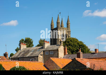 All Saints Church over rooftops, Helmsley, North Yorkshire Stock Photo