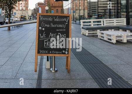 Humorous sign for dog friendly cafe bar, Gin N' Juice Cafe Bar, Liverpool, UK Stock Photo