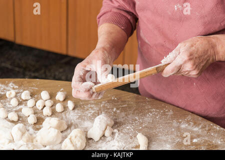Homemade potato gnocchi being prepared Stock Photo