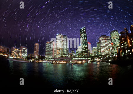 Colorful night time graphic sunset of  Sydney Skyline from Circular Quay  in New South Wales Australia Stock Photo