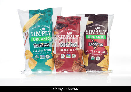 3 bags of snack chips, Simply Organic Tostitos Corn, Simply Organic Doritos and Simply Tostitos Black Bean Chips on white background isolated USA Stock Photo