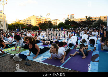 International Yoga day in Tel-Aviv. Yoga practice at Rabin sq. Stock Photo