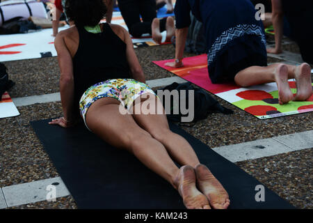 International Yoga day in Tel-Aviv. Yoga practice at Rabin sq. Stock Photo