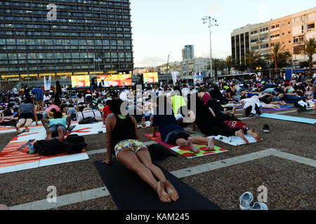 International Yoga day in Tel-Aviv. Yoga practice at Rabin sq. Stock Photo