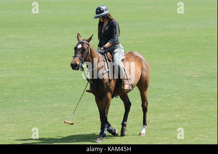 WEST PALM BEACH, FL - MARCH 14:  Kourtney Kardashian and Scott Disick with their young son Mason Dash Disick in tow take a polo lesson with top ranked american polo player Nic Roldan. The couple was joined by sister Khloe Kardashian. The kardashian clan had a great afternoon, riding horses and joking around while they sipped champagne at the International polo club palm beach on March 14, 2010 in Wellington, Florida.  People:  Khloe Kardashian  Transmission Ref:  FLXX  Hoo-Me.com/ MediaPunch Stock Photo