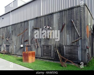 A display wall of vintage tools and equipment Stock Photo
