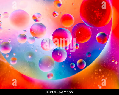 Purple, orange, red and blue psychedelic oil and water abstract, unfocused Stock Photo