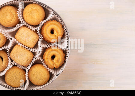 Closeup of Danish butter cookies in tin with copyspace Stock Photo