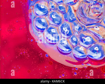 Abstract blue bubbles of oxygen floating towards the surface Stock Photo