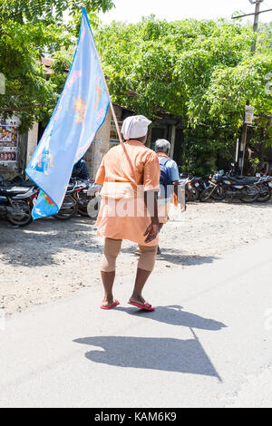 PONDICHERY, PUDUCHERY, INDIA - AUGUST 28, 2017. Unidentified christians, catholics, hinduists people, with orange dress, pilgrims walk from chennai to Stock Photo
