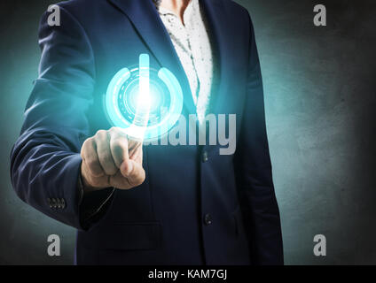 Businessman pressing power futuristic button. Stock Photo