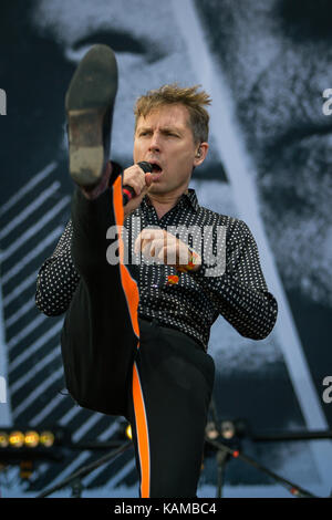 The American-Scottish super group FFS (Franz Ferdinand and Sparks) consists of members of the two bands Franz Ferdinand and Sparks who here perform a live concert at the music festival Lollapalooza 2015 in Berlin. Here singer Alex Kapranos is pictured live on stage. Germany, 12/09 2015. Stock Photo